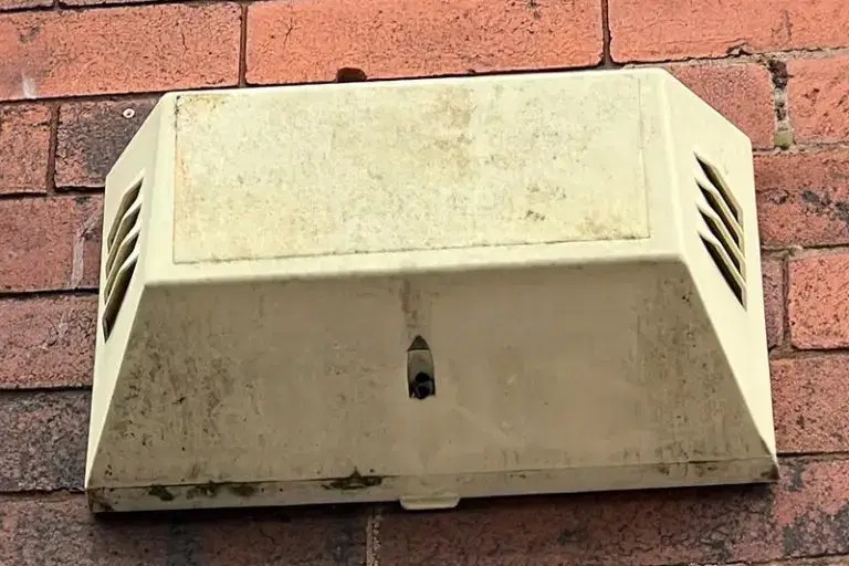 Old unbranded faded alarm bell box